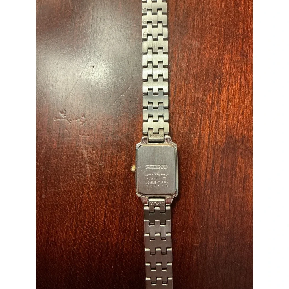Seiko Womens Two Tone Tank Watch 1N01-0FH0 Silver Gold Rectangular White Dial